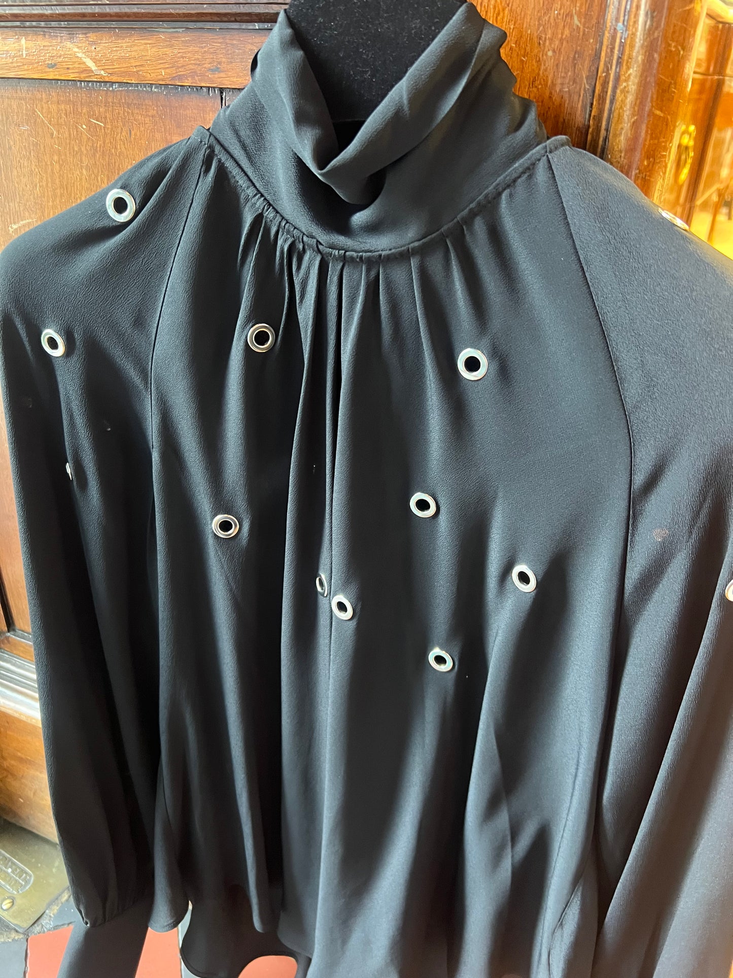 Beatrice B Black Silk Mix Blouse with Metal Eyelets and Neck Tie