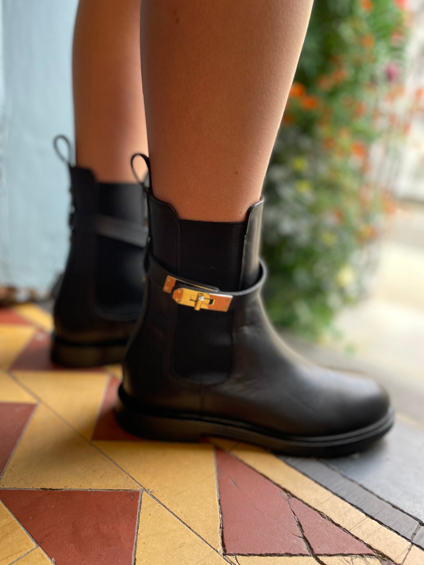 Black Leather Boots with Gold Clasp Detail