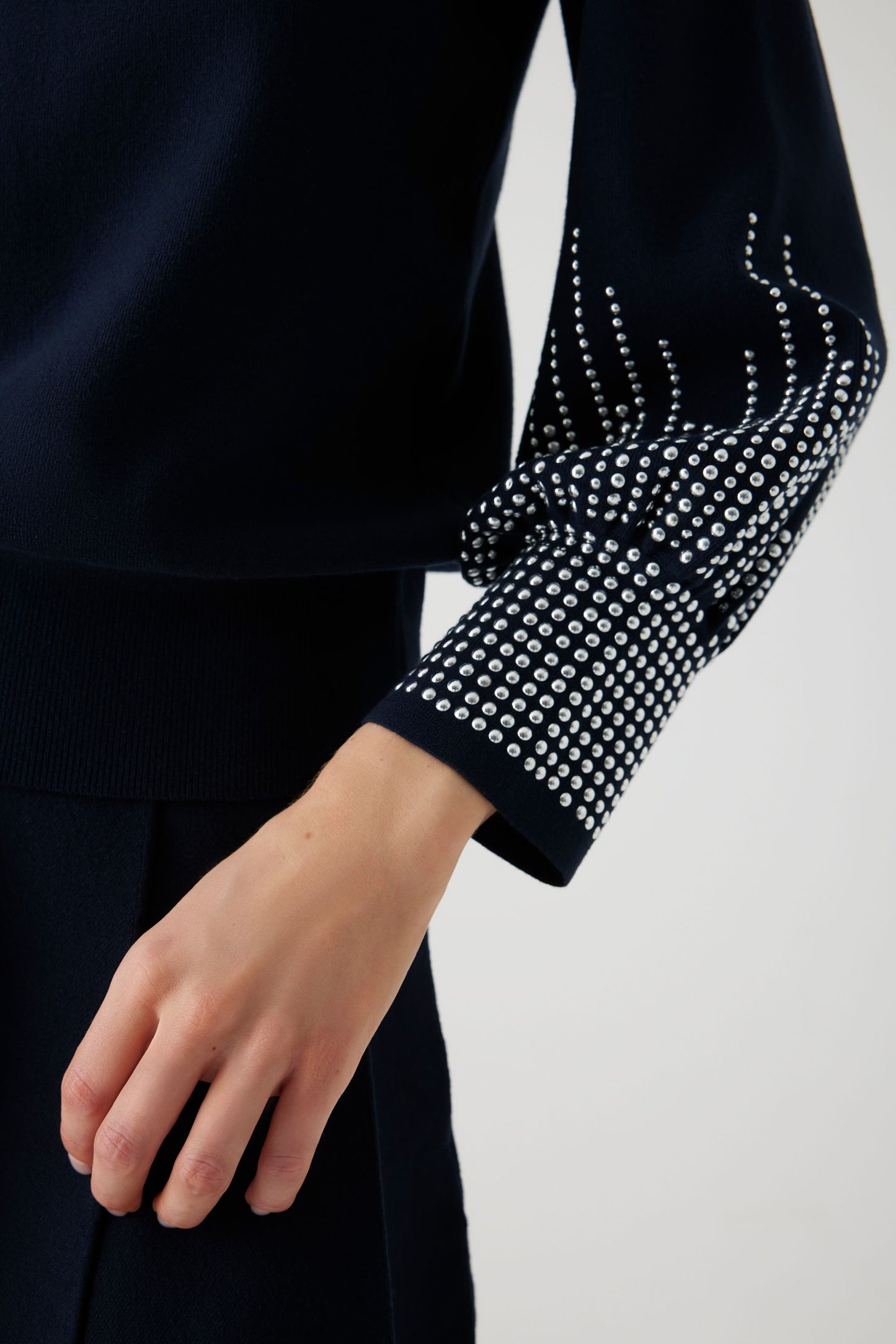 Autumn Navy Knit Top with Silver Studded Embellishment on the Sleeves