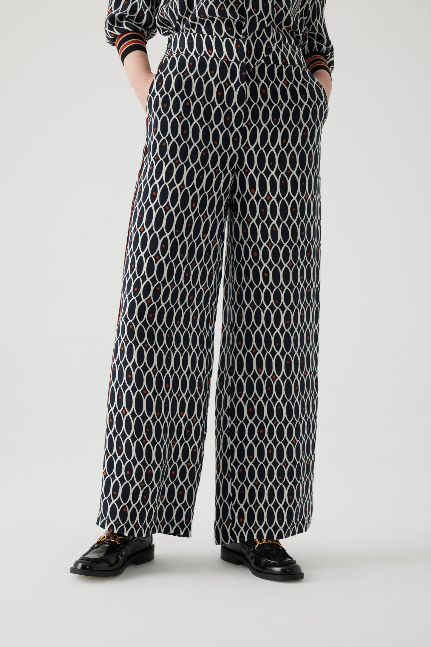 Adia Black and White Print Trousers with a Rust Trim